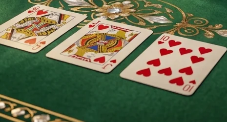 queen, jack and ten of hearts sitting on the felt like they were waiting for me
